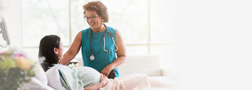 woman talking to doctor